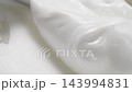 White smooth eye, makeup skin cream texture, closeup beauty facial cosmetic mask 143994831