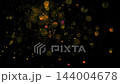 Colorful glitter sparkles and glows against a black background, creating a festive atmosphere for celebrations, party visuals and holiday designs 144004678
