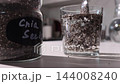 Chia Seeds Gel Formation in Water: Hydration and Fiber Visualization on a Kitchen Counter 144008240
