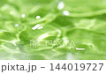 Water surface splash, ripple wave texture. Closeup pouring water in slow motion 144019727